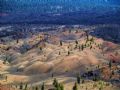 Essas dunas com rvores espalhadas ficam no Parque Nacional Lassen Volcanic, na Califrnia. A vista, como pode ver,  como uma pintura a leo. Tapearia de Deus na Terra. A descrio  dos autores James e Kelly Stone e no deixa dvidas.