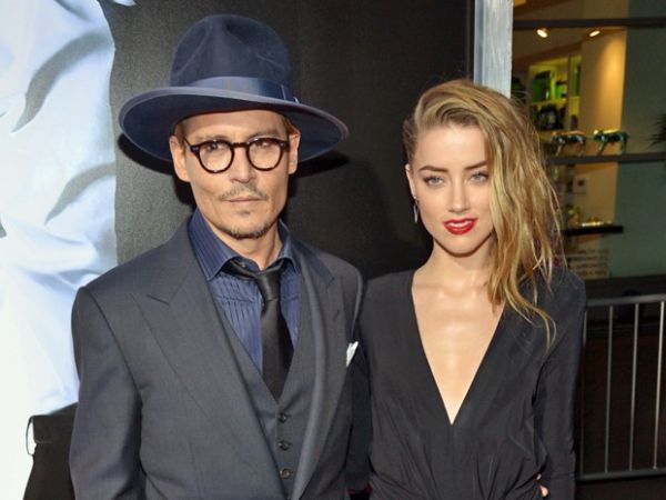 Johnny Depp e a atriz Amber Heard na pr-estreia do filme '3 dias para matar' em fevereiro de 2014, em Los Angeles